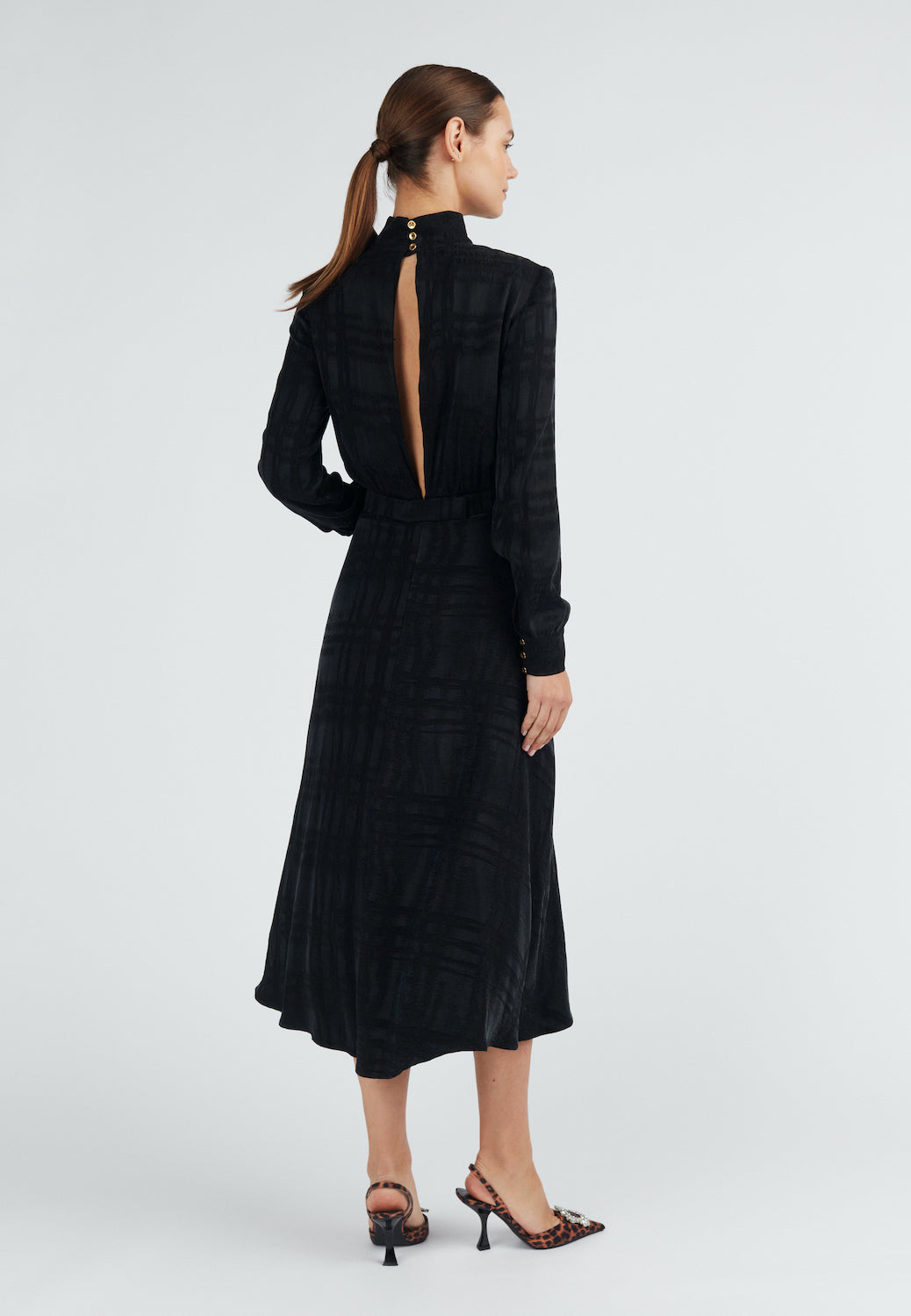 Black cupro open back turtleneck dress