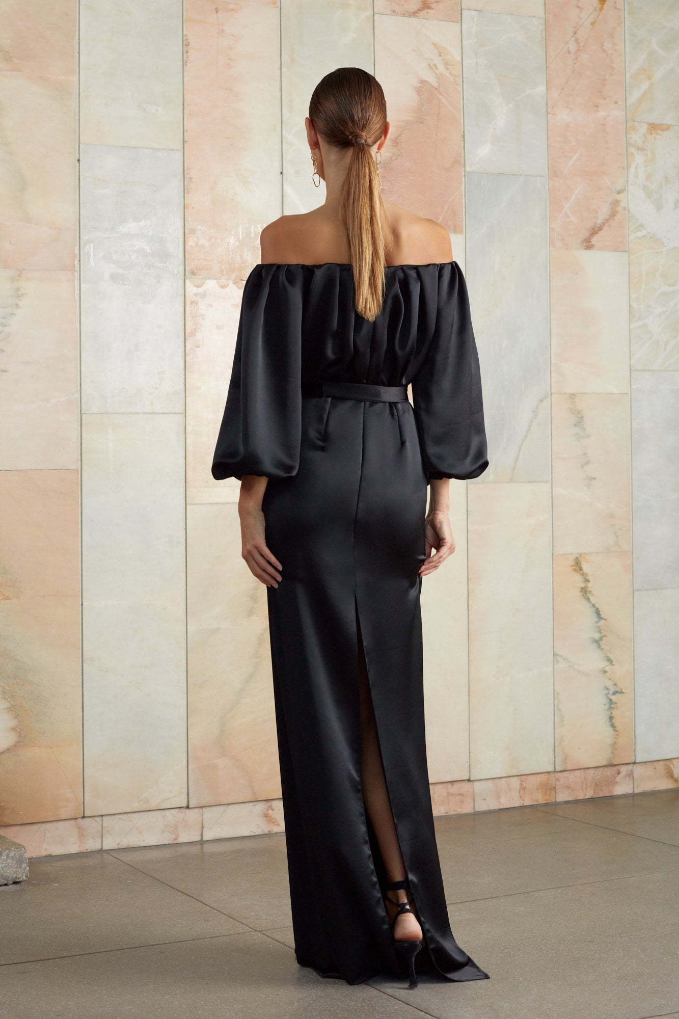 Long black dress with split in the back
